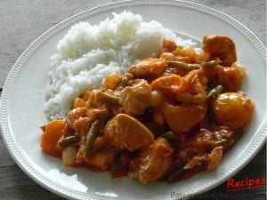 Chicken in asian sweet and sour sauce with rice